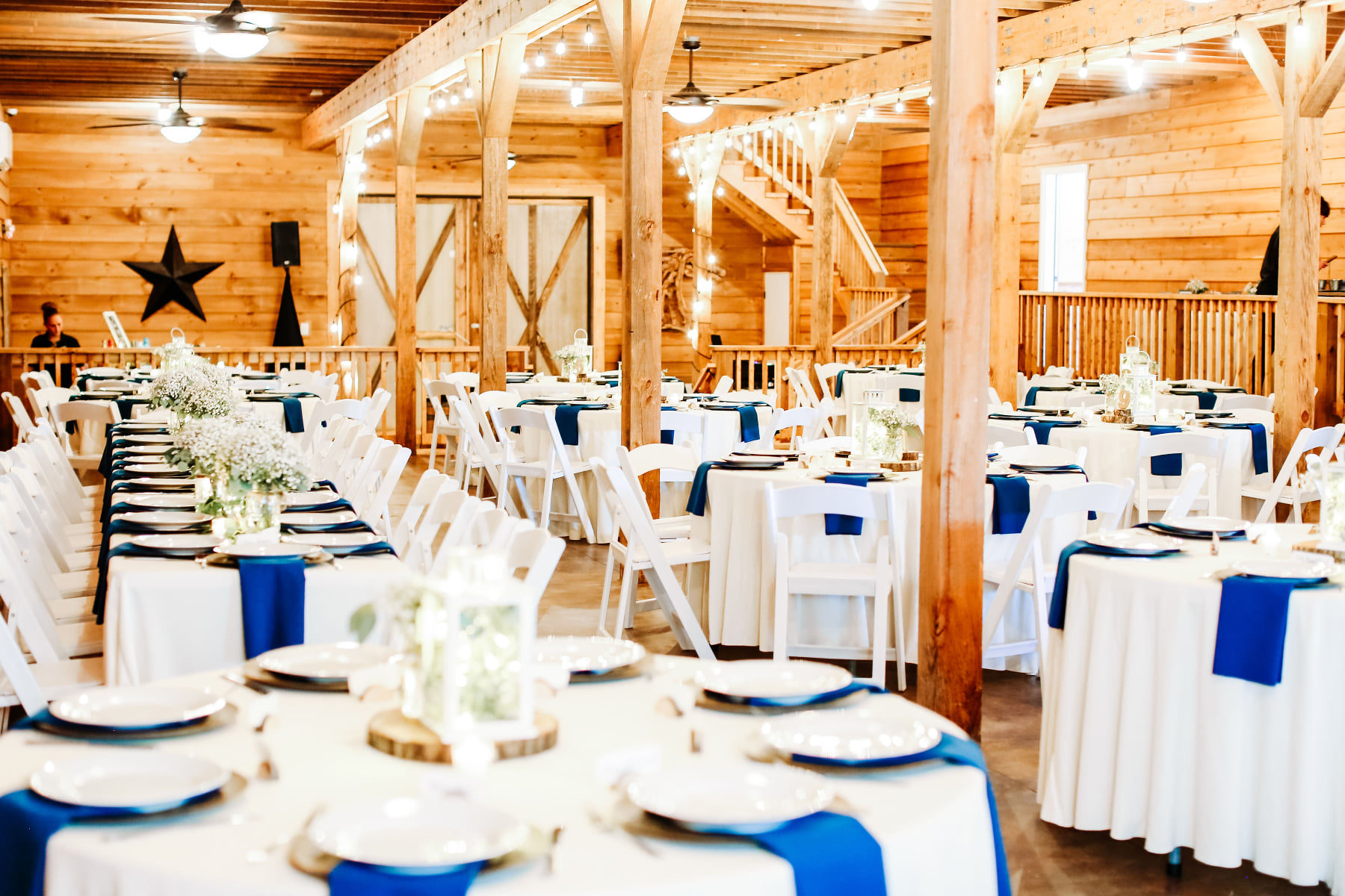 Malden Hill's barn set up for a wedding reception dinner