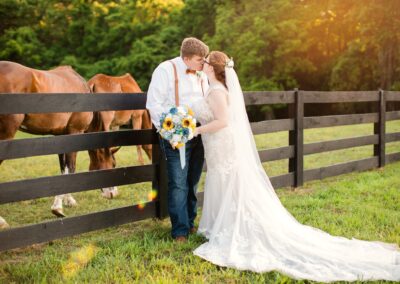 Bride and Groom with horses at Malden Hill Venue in Virginia